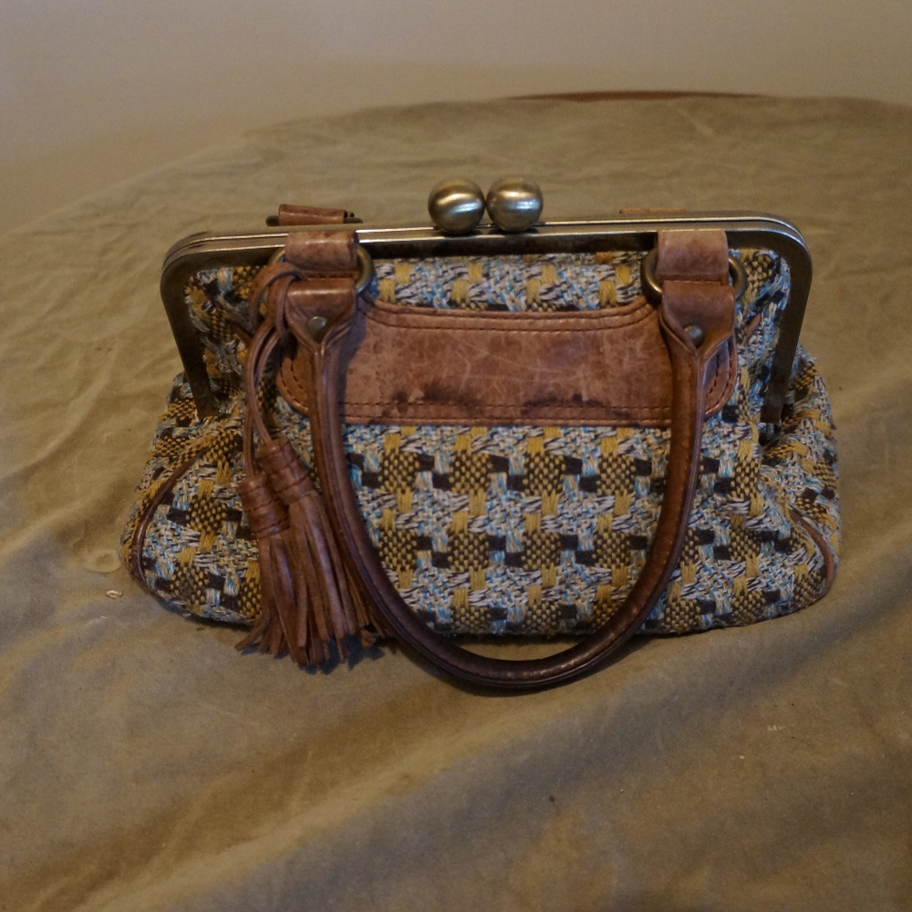 Nest leather and textile kisslock purse